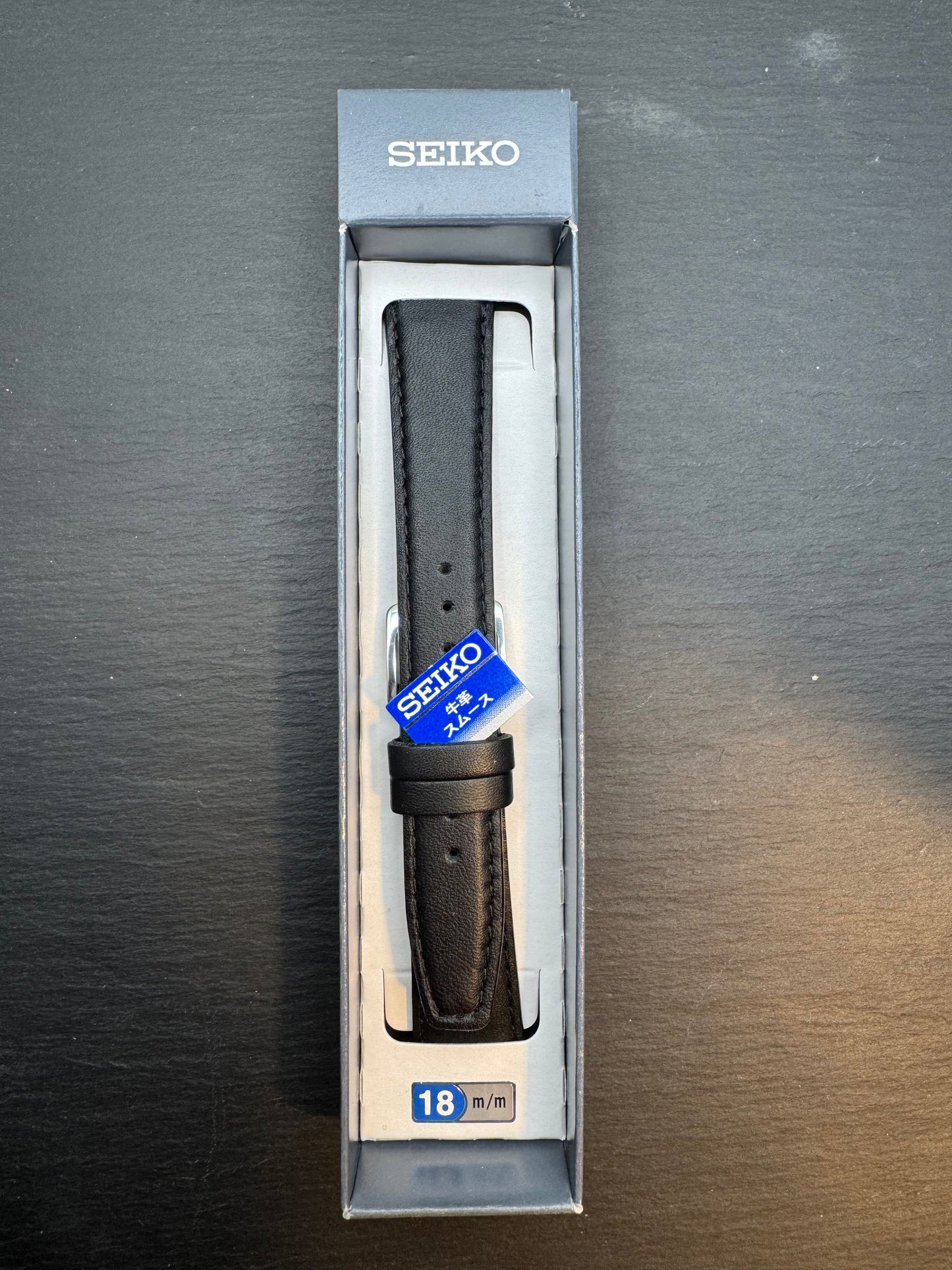 Seiko JDM Armband DXH3A 18 mm (18-15) – glattes Rindleder, schwarz, silberfarbene Schließe (JDM)