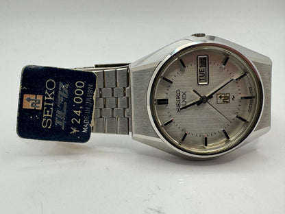 Seiko ELNIX Ref. 0703-7110 · Silbernes Sunburst-Zifferblatt · Mai 1975 · JDM · NOS - Originalband, Hangtag &amp; Anleitung