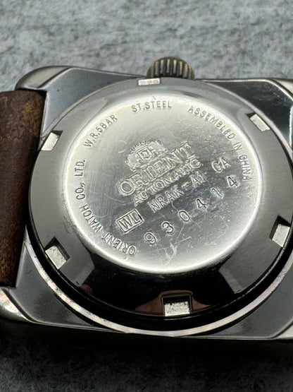 Orient Automatic - burgundy dial, rectangular case 26.5 x 31.1 mm, disc display