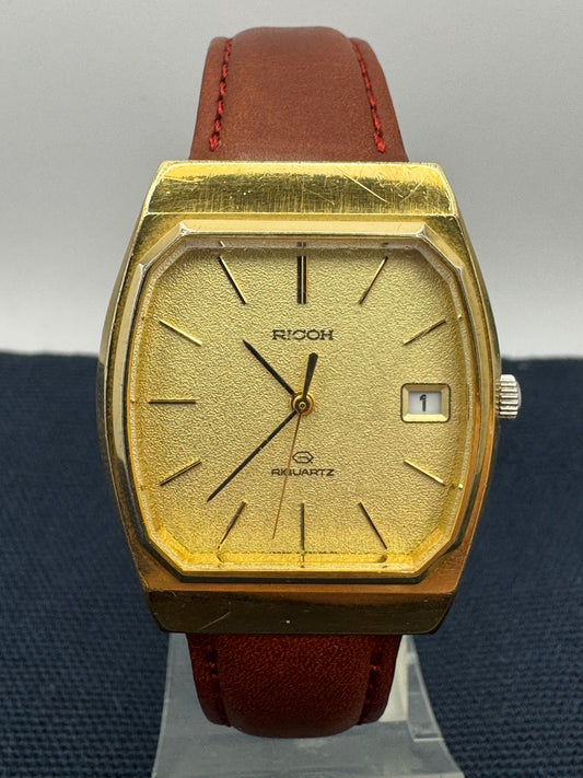 Ricoh Riquartz – Gold Tonneau Dress Watch (Japan, ca. 1970er Jahre)