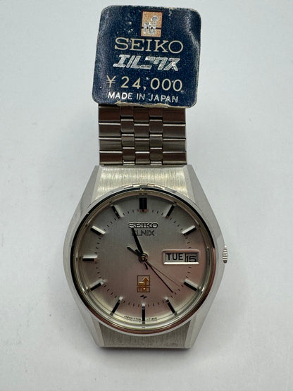 Seiko ELNIX Ref. 0703-7110 · Silbernes Sunburst-Zifferblatt · Mai 1975 · JDM · NOS - Originalband, Hangtag &amp; Anleitung