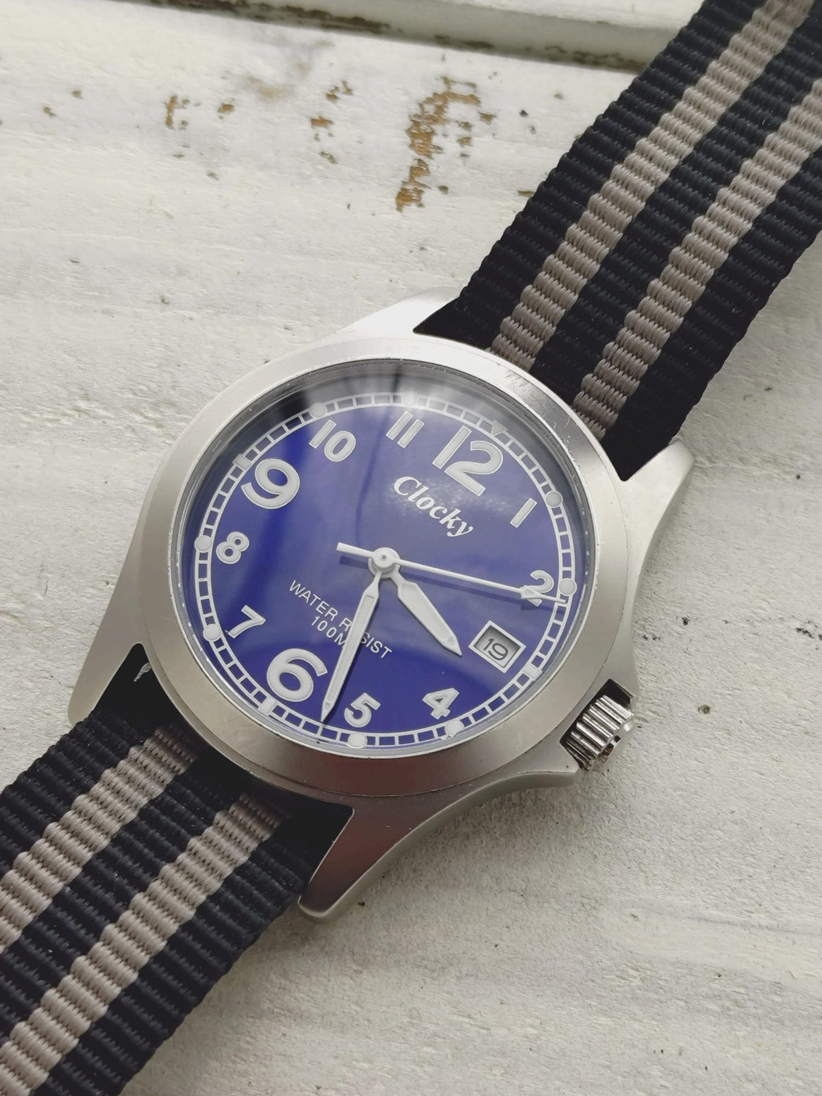 Clocky KY020M – blue dial, 10 BAR, stainless steel – compact 33.1mm – revised 2026