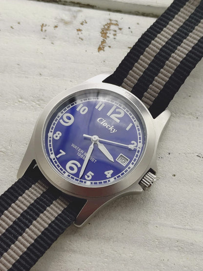 Clocky KY020M – blue dial, 10 BAR, stainless steel – compact 33.1mm – revised 2026