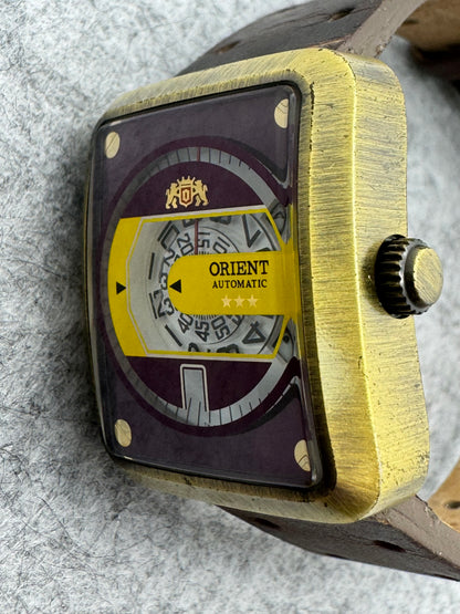 Orient Automatic - burgundy dial, rectangular case 26.5 x 31.1 mm, disc display