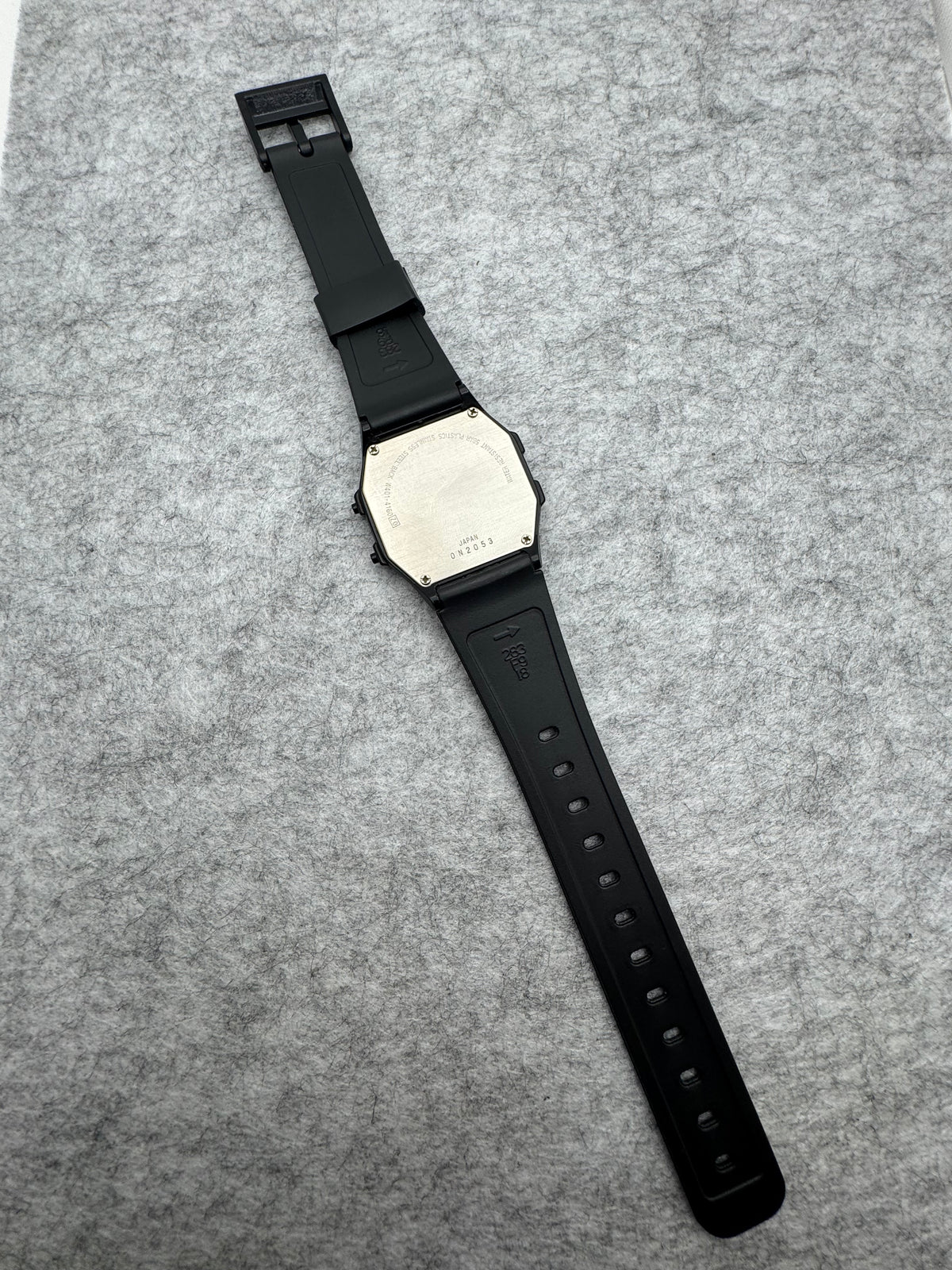 ALBA Digital W401-4160 „Lithium" – November 1990 – schwarz-goldene JDM-Digitaluhr – revidiert, neues Band