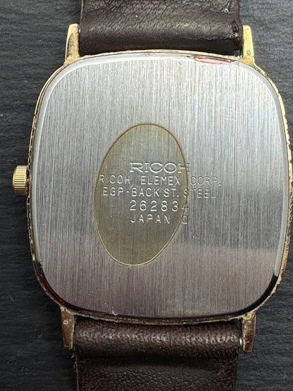 Ricoh Quartz Vintage Dress Watch Ref. 26283-4 – vergoldete rechteckige Japan-Dresswatch mit Originalbox, späte 1980er