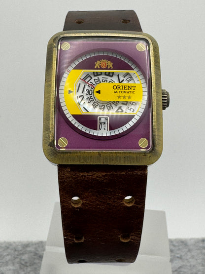 Orient Automatic - burgundy dial, rectangular case 26.5 x 31.1 mm, disc display