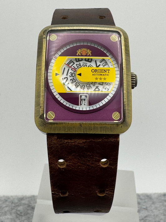 Orient Automatic - burgundy dial, rectangular case 26.5 x 31.1 mm, disc display