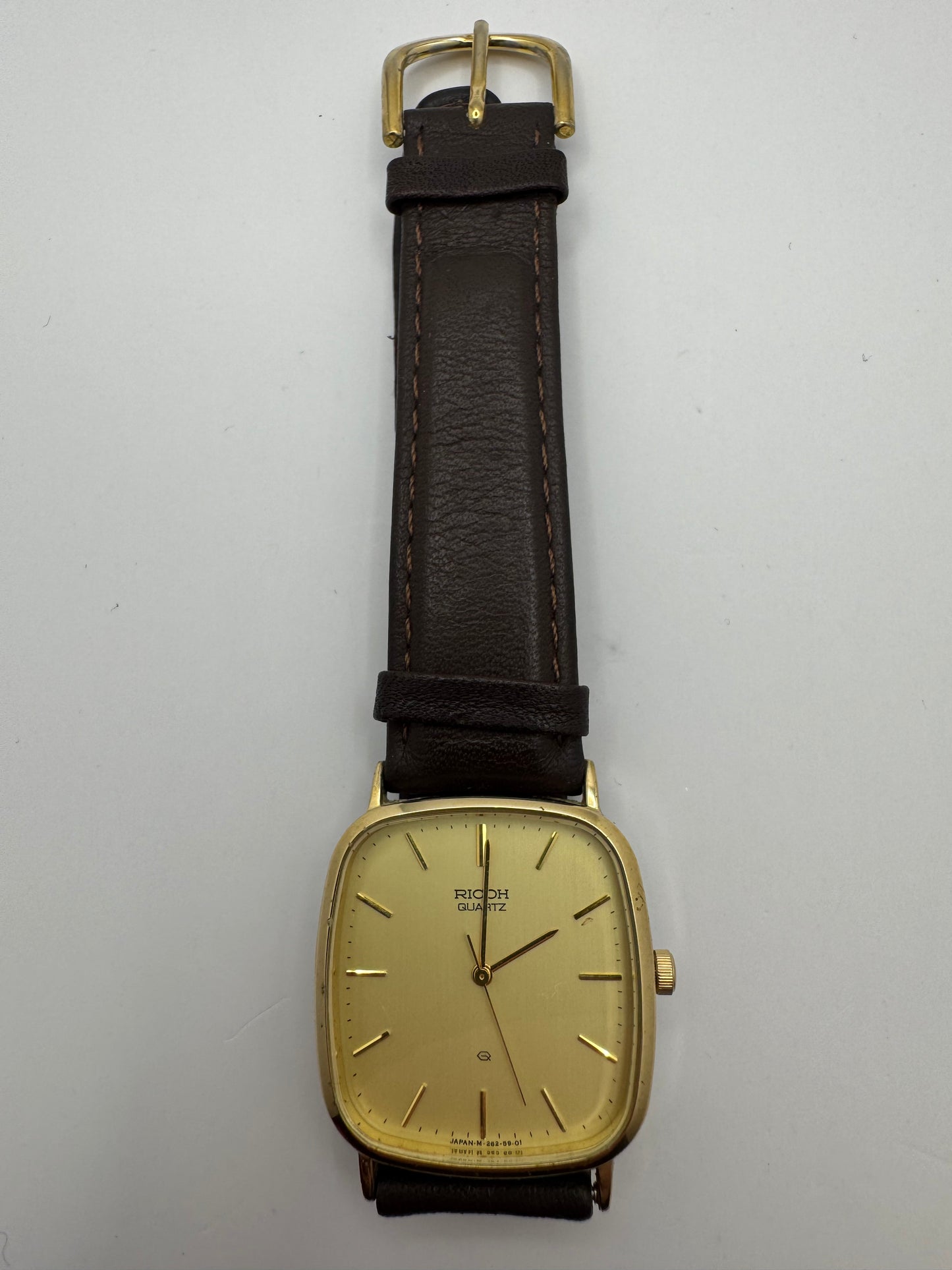 Ricoh Quartz Vintage Dress Watch Ref. 26283-4 – vergoldete rechteckige Japan-Dresswatch mit Originalbox, späte 1980er