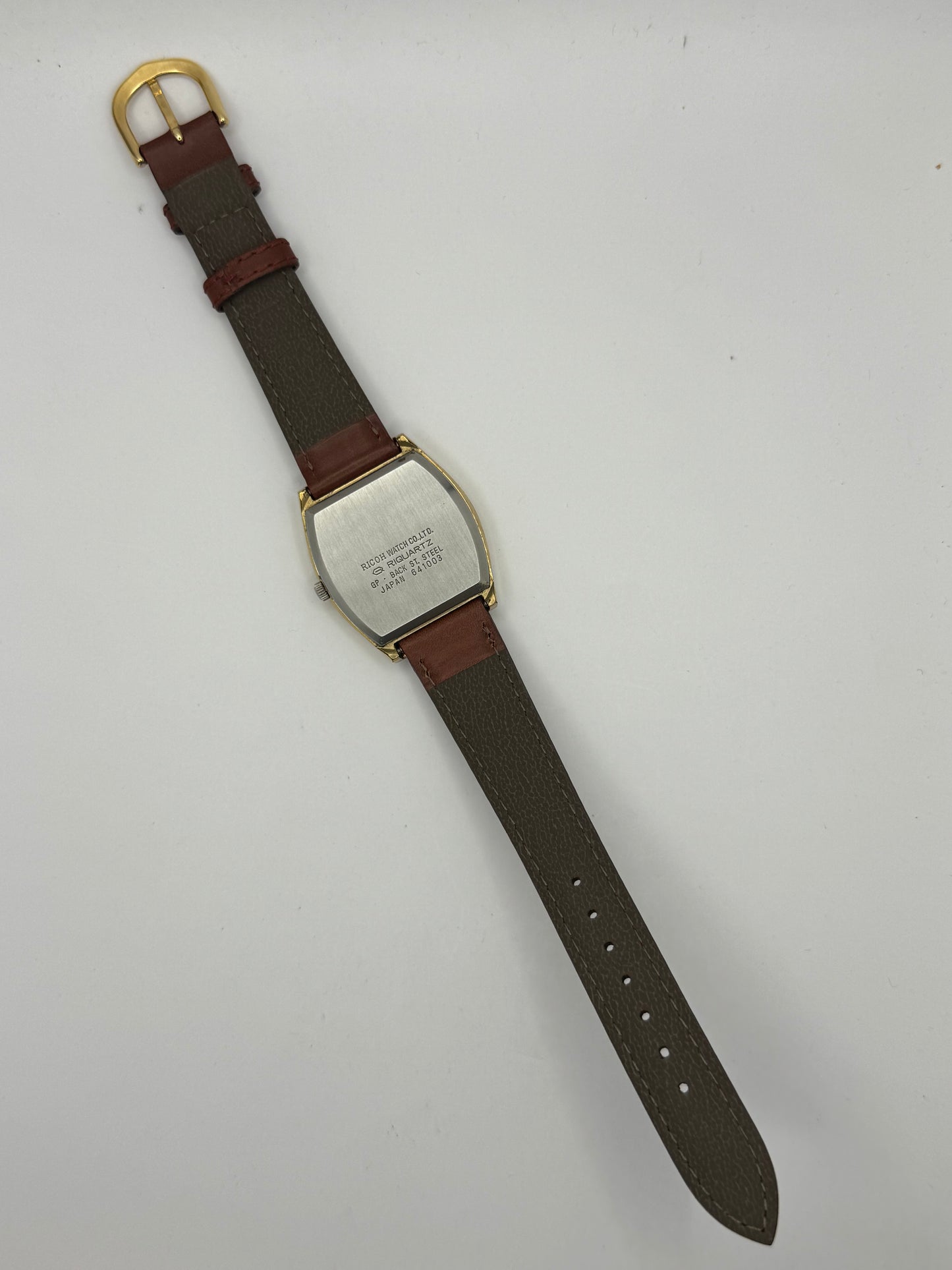 Ricoh Riquartz – Gold Tonneau Dress Watch (Japan, ca. 1970er Jahre)