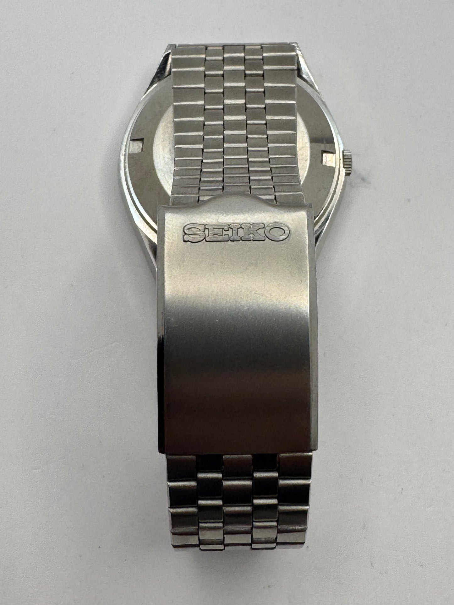 Seiko ELNIX Ref. 0703-7110 · Silbernes Sunburst-Zifferblatt · Mai 1975 · JDM · NOS - Originalband, Hangtag &amp; Anleitung