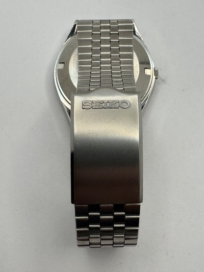 Seiko ELNIX Ref. 0703-7110 · Silbernes Sunburst-Zifferblatt · Mai 1975 · JDM · NOS - Originalband, Hangtag &amp; Anleitung