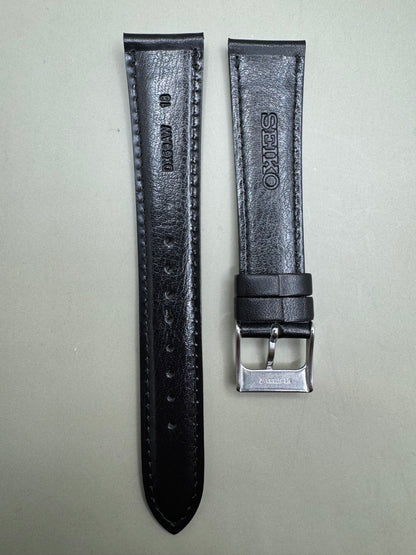 Original Seiko Lederarmband DX59A (18–15 mm) - schwarz mit silberfarbener Dornschließe (JDM)