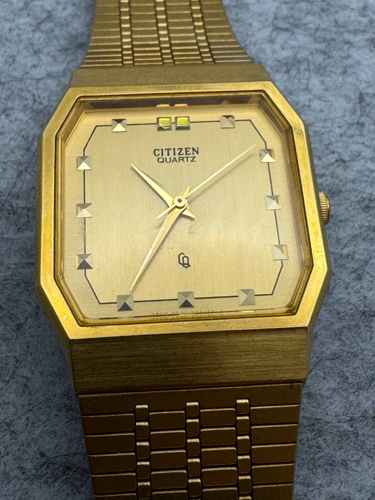 Citizen Quarz – April 1987 – achteckiges Gehäuse, goldfarben – ungetragen mit Originalarmband