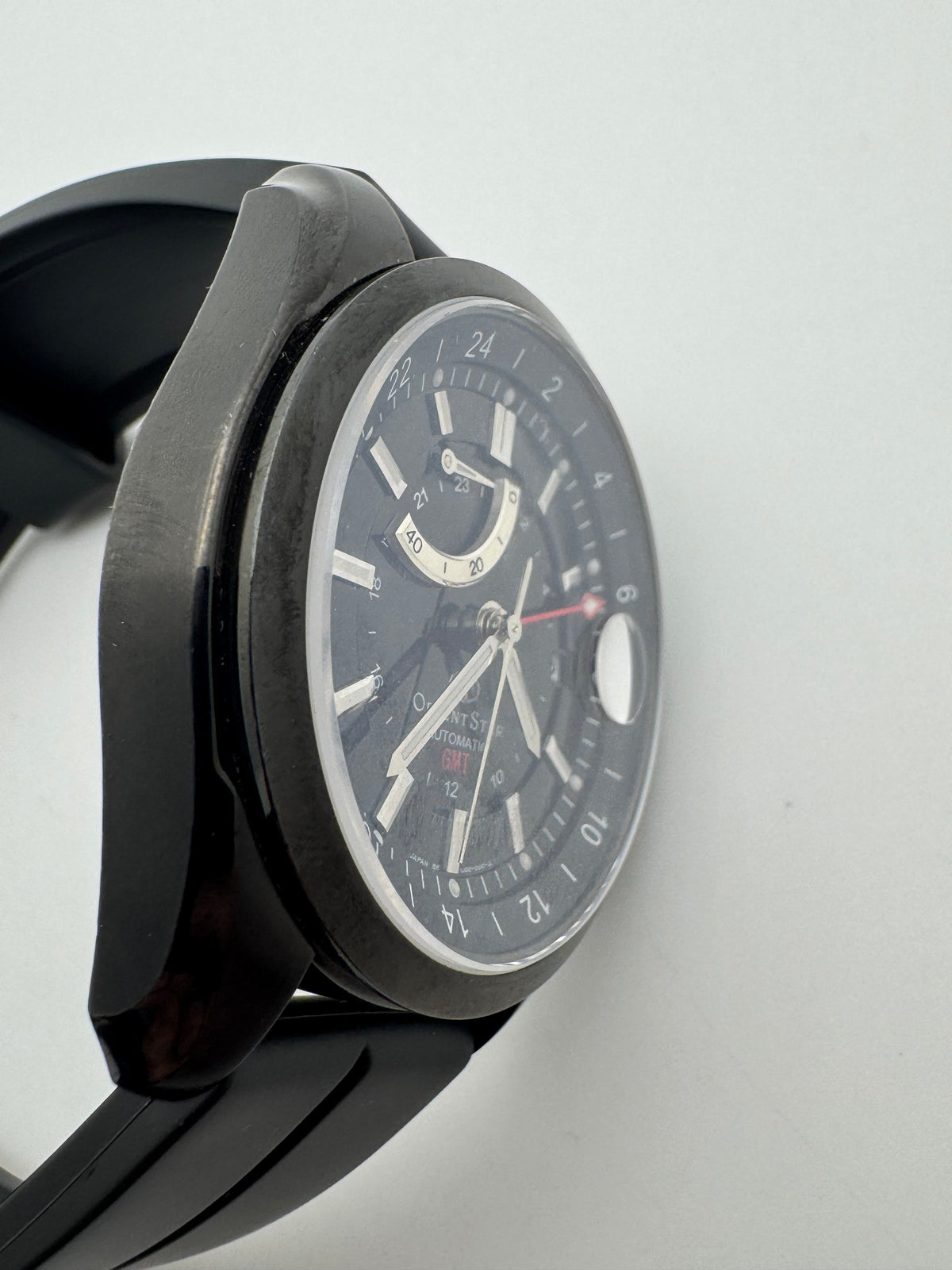 Orient Star Automatic GMT – black ion-plated, power reserve and second time zone – exhibition case back