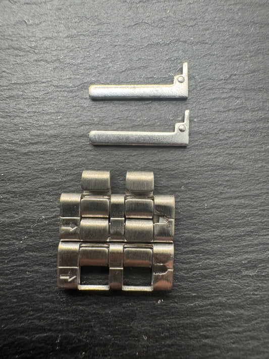ALBA EPSILON (Seiko) ASSD069 – Ersatz-Armbandglied Titan – 1 Stück / Einzelglied inkl. Verbindungsstift – NOS mit Original-Anhängern