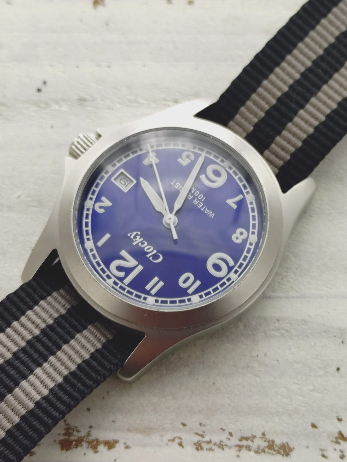 Clocky KY020M – blue dial, 10 BAR, stainless steel – compact 33.1mm – revised 2026