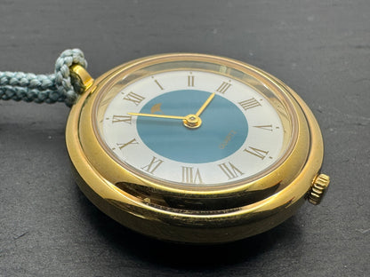 Vintage Pendant Watch · Quartz · Gold-tone with blue Hō-ō enamel back and silk cord · Japan, circa 1970s/80s