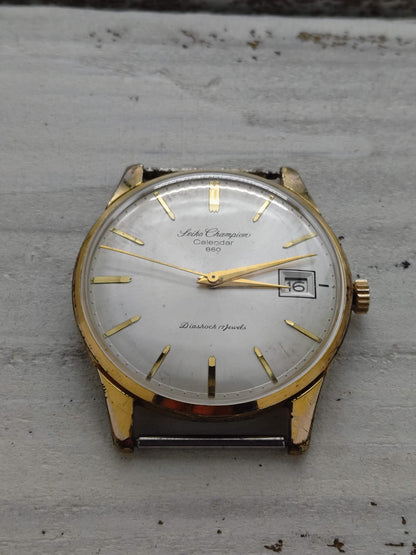 Seiko Champion Calendar 860 – Réf. J15017 – Calibre 860, remontage manuel, Daini Seikosha – 1963 – fraîchement révisée