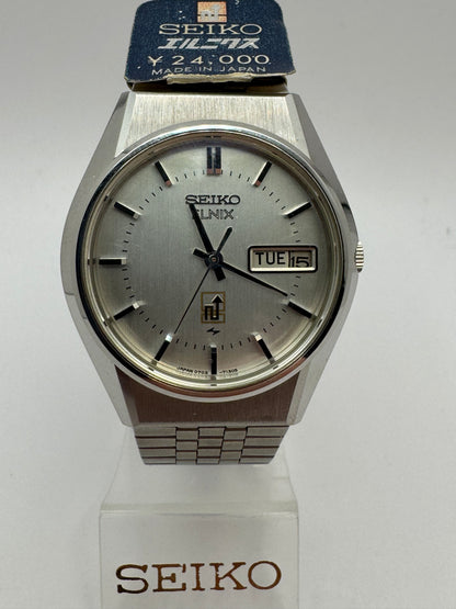 Seiko ELNIX Ref. 0703-7110 · Silbernes Sunburst-Zifferblatt · Mai 1975 · JDM · NOS - Originalband, Hangtag &amp; Anleitung