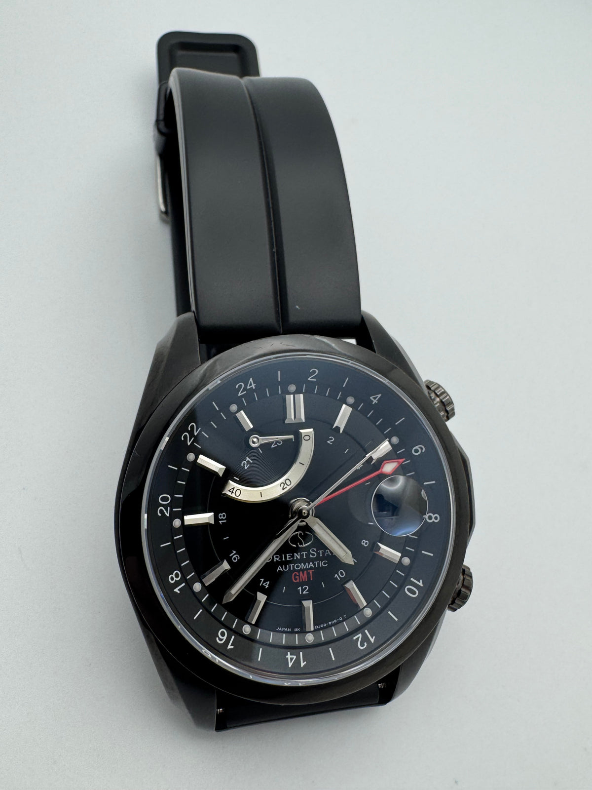 Orient Star Automatic GMT – black ion-plated, power reserve and second time zone – exhibition case back