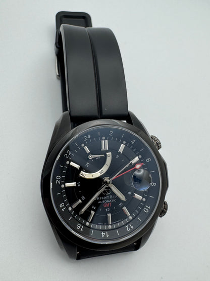 Orient Star Automatic GMT – black ion-plated, power reserve and second time zone – exhibition case back