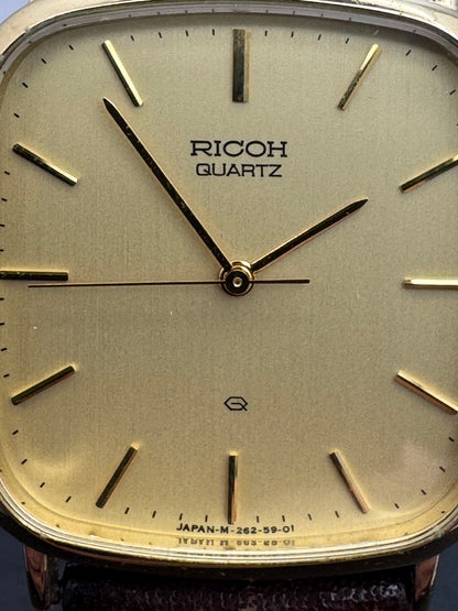 Ricoh Quartz Vintage Dress Watch Ref. 26283-4 – vergoldete rechteckige Japan-Dresswatch mit Originalbox, späte 1980er