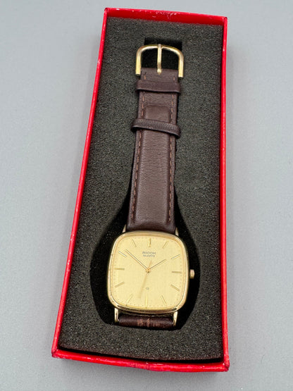 Ricoh Quartz Vintage Dress Watch Ref. 26283-4 – vergoldete rechteckige Japan-Dresswatch mit Originalbox, späte 1980er