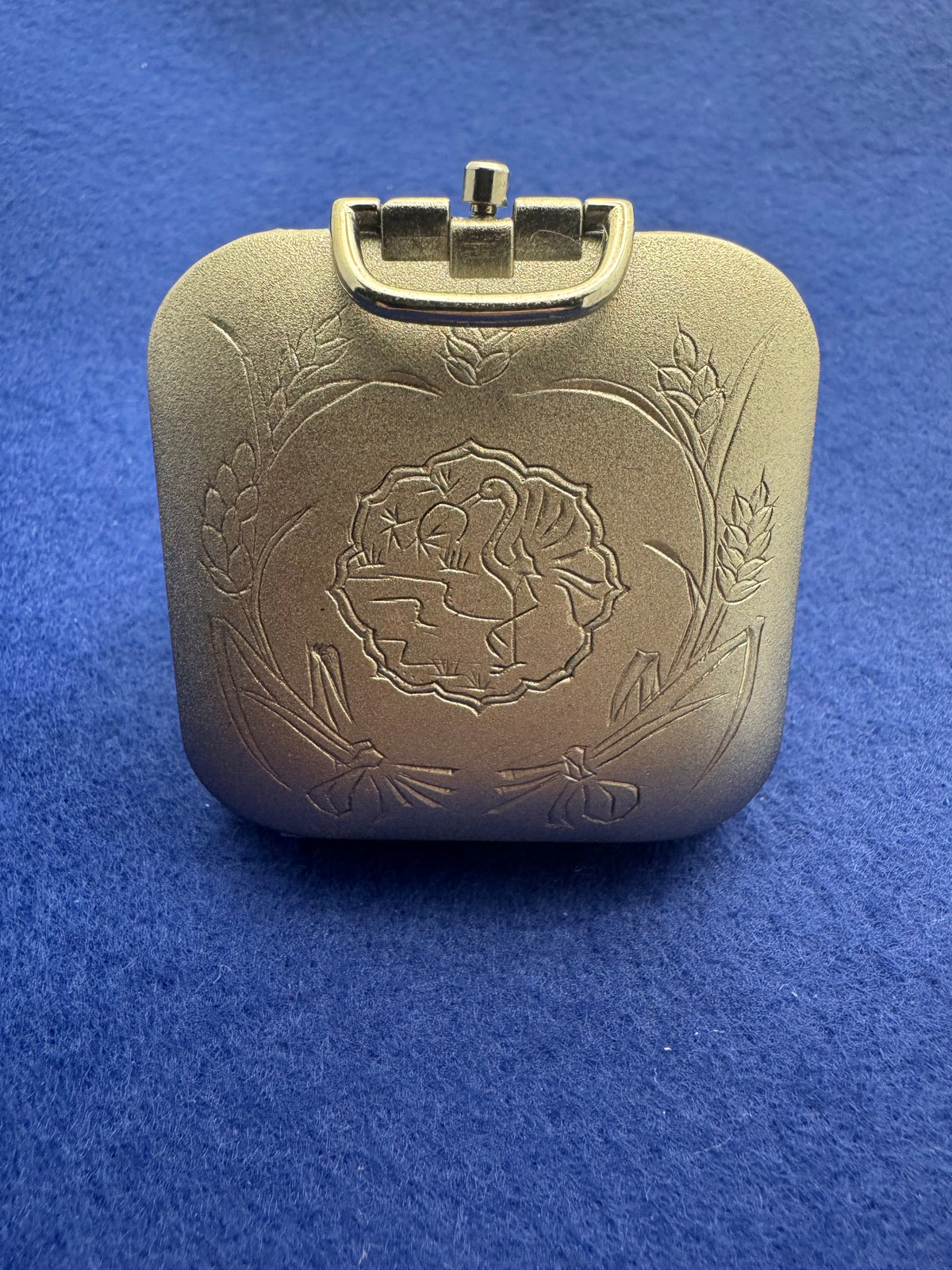 Japanese pocket alarm clock – quartz – engraved folding case with crane and ear of corn motif