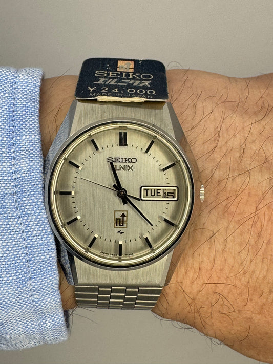 Seiko ELNIX Ref. 0703-7110 · Silbernes Sunburst-Zifferblatt · Mai 1975 · JDM · NOS - Originalband, Hangtag &amp; Anleitung
