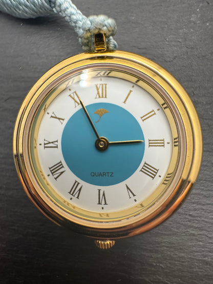 Vintage Pendant Watch · Quartz · Gold-tone with blue Hō-ō enamel back and silk cord · Japan, circa 1970s/80s