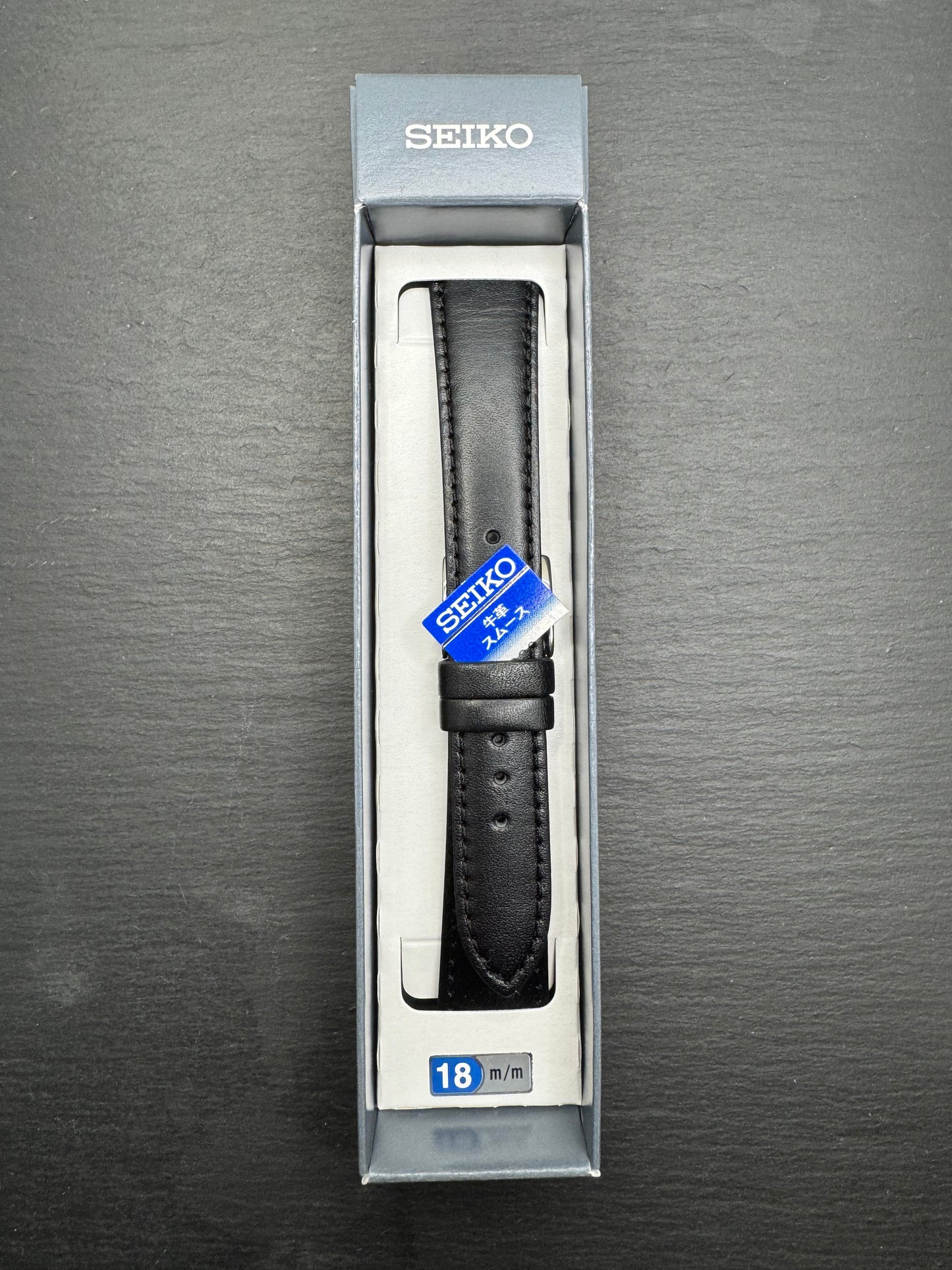 Original Seiko Lederarmband DX59A (18–15 mm) - schwarz mit silberfarbener Dornschließe (JDM)