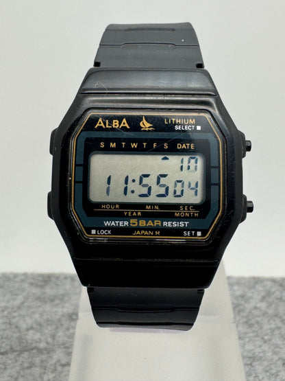 ALBA Digital W401-4160 „Lithium" – November 1990 – schwarz-goldene JDM-Digitaluhr – revidiert, neues Band