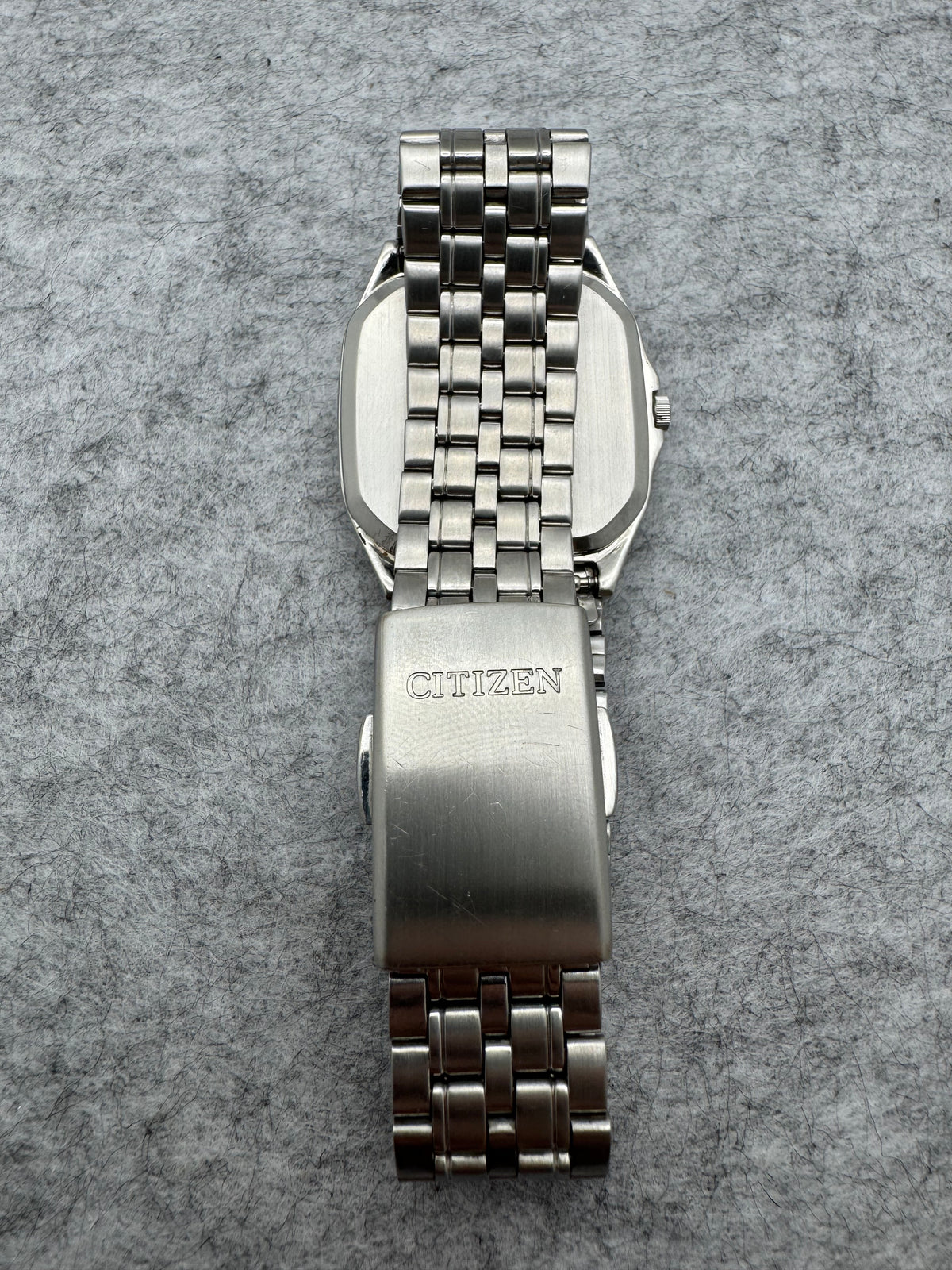 Citizen Quarz 5500-S023211 – November 1994 – quadratisches Gehäuse, Tag/Datum, 10 bar – originales Stahlarmband