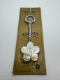 Expo '70 keychain with mother-of-pearl cherry blossom – unworn on original card with seal of authenticity