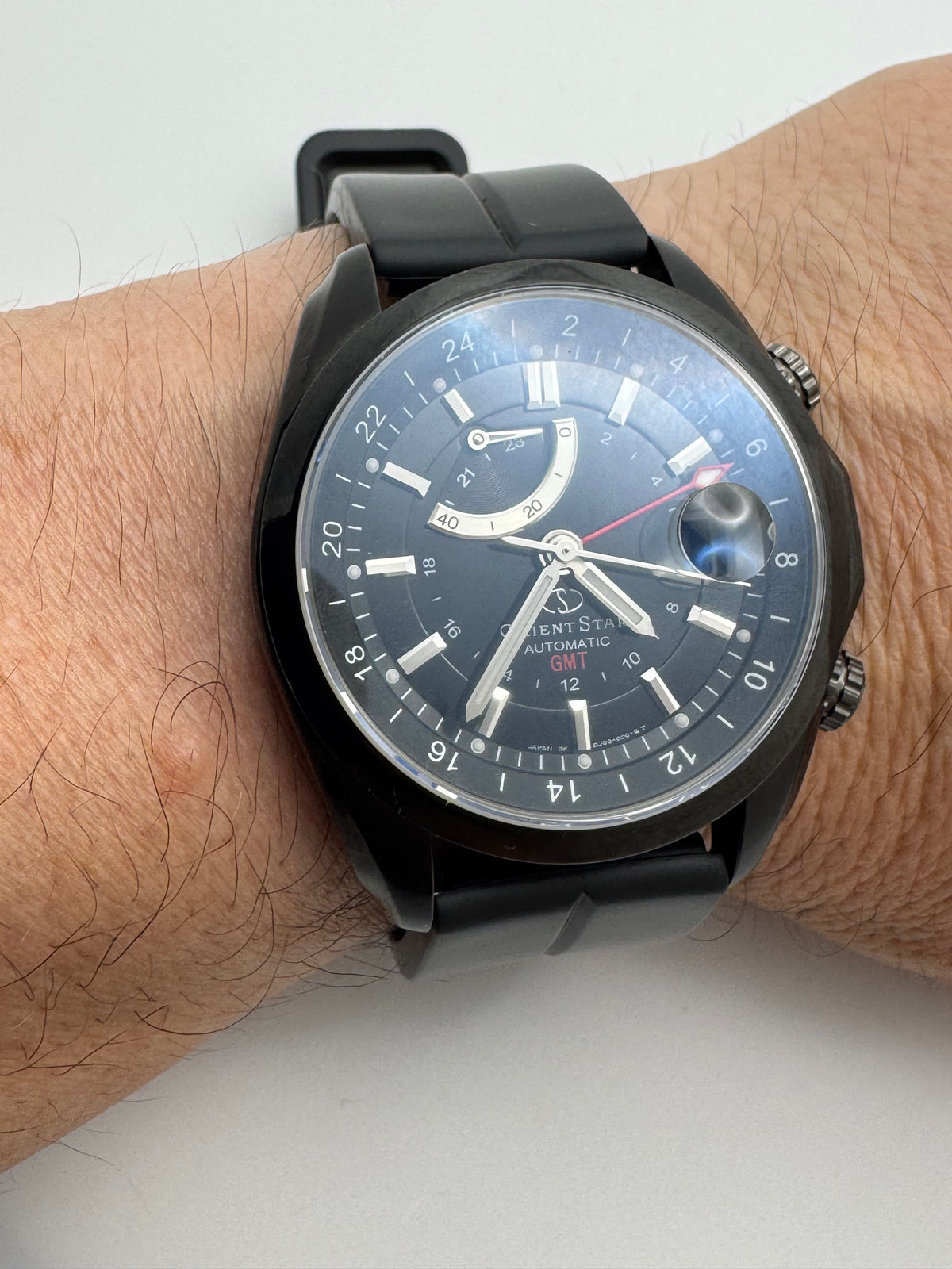 Orient Star Automatic GMT – black ion-plated, power reserve and second time zone – exhibition case back