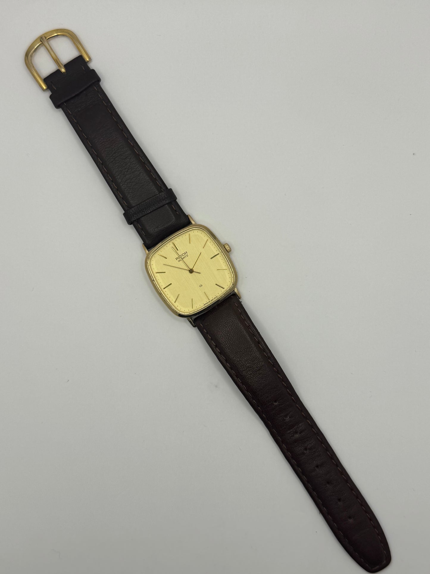 Ricoh Quartz Vintage Dress Watch Ref. 26283-4 – vergoldete rechteckige Japan-Dresswatch mit Originalbox, späte 1980er