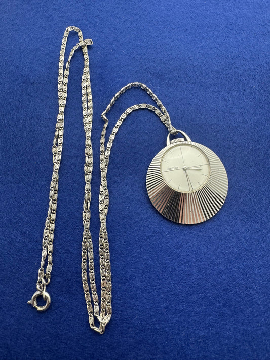 Montre pendentif Seiko Réf. 21-7050 – Remontage manuel – Février 1977 – AWGP – Vintage Japon