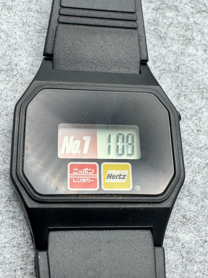 Montre publicitaire Nippon Rent-A-Car / Hertz – montre numérique japonaise issue d'une campagne de coopération – révisée
