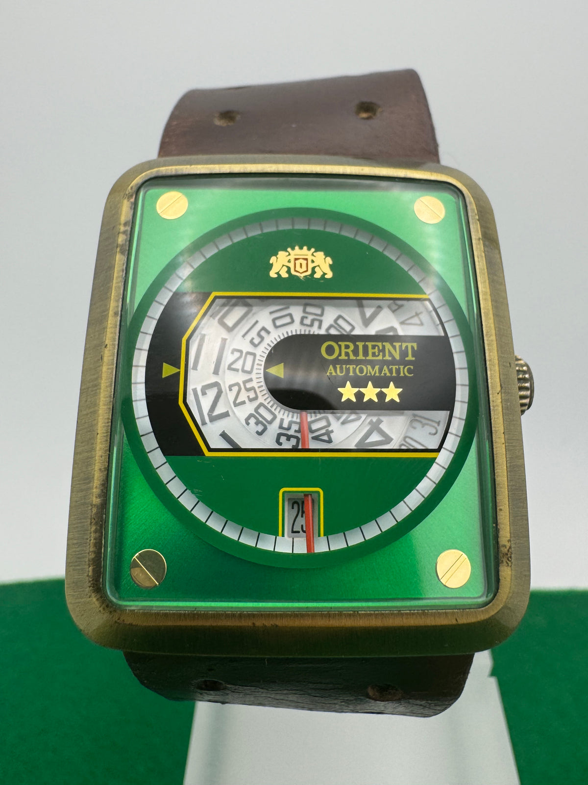 Orient Automatic – green dial, rectangular case – disc display – 35.8 × 40.7 mm