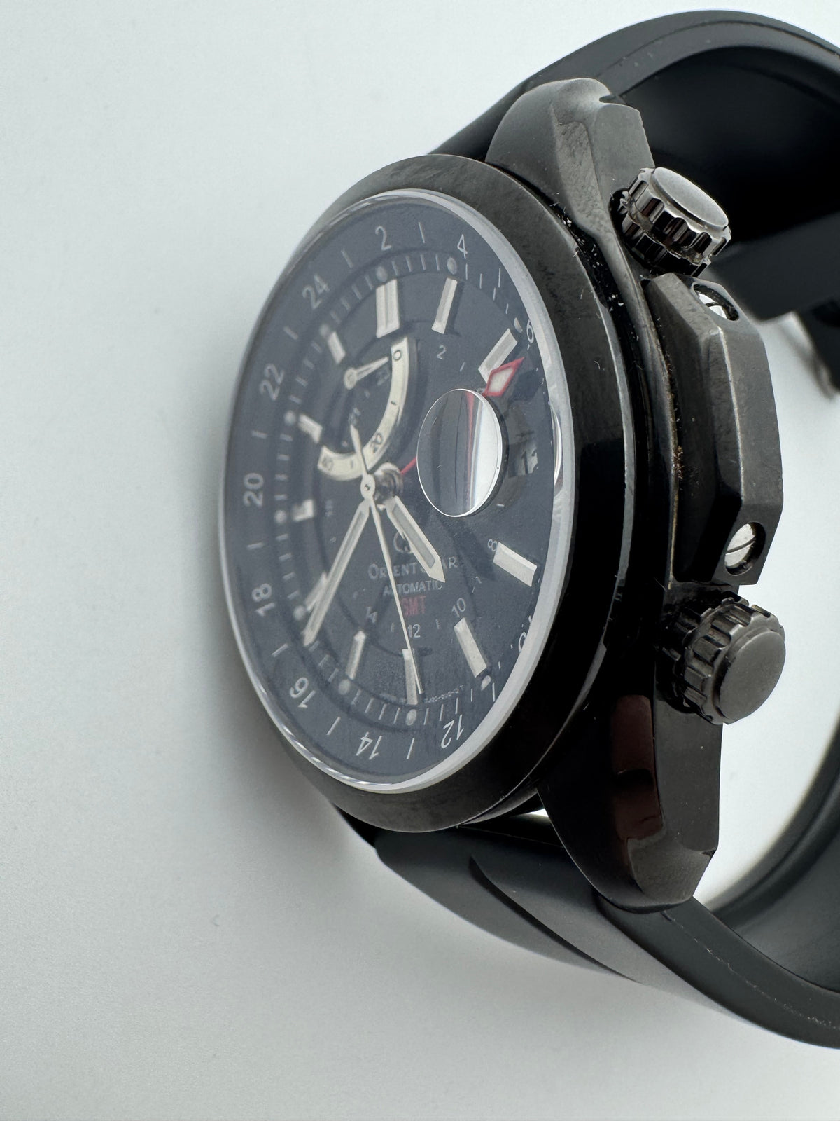 Orient Star Automatic GMT – black ion-plated, power reserve and second time zone – exhibition case back