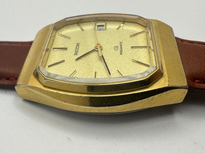 Ricoh Riquartz – Gold Tonneau Dress Watch (Japan, ca. 1970er Jahre)