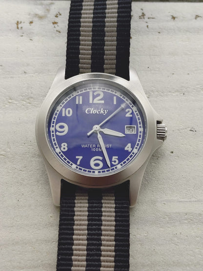 Clocky KY020M – blue dial, 10 BAR, stainless steel – compact 33.1mm – revised 2026