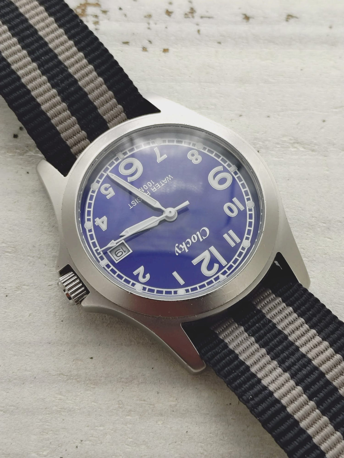 Clocky KY020M – blue dial, 10 BAR, stainless steel – compact 33.1mm – revised 2026