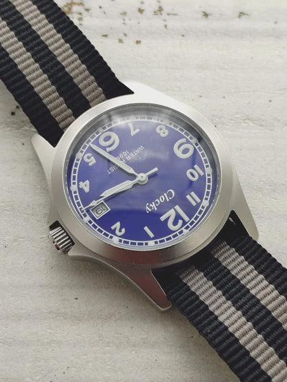 Clocky KY020M – blue dial, 10 BAR, stainless steel – compact 33.1mm – revised 2026