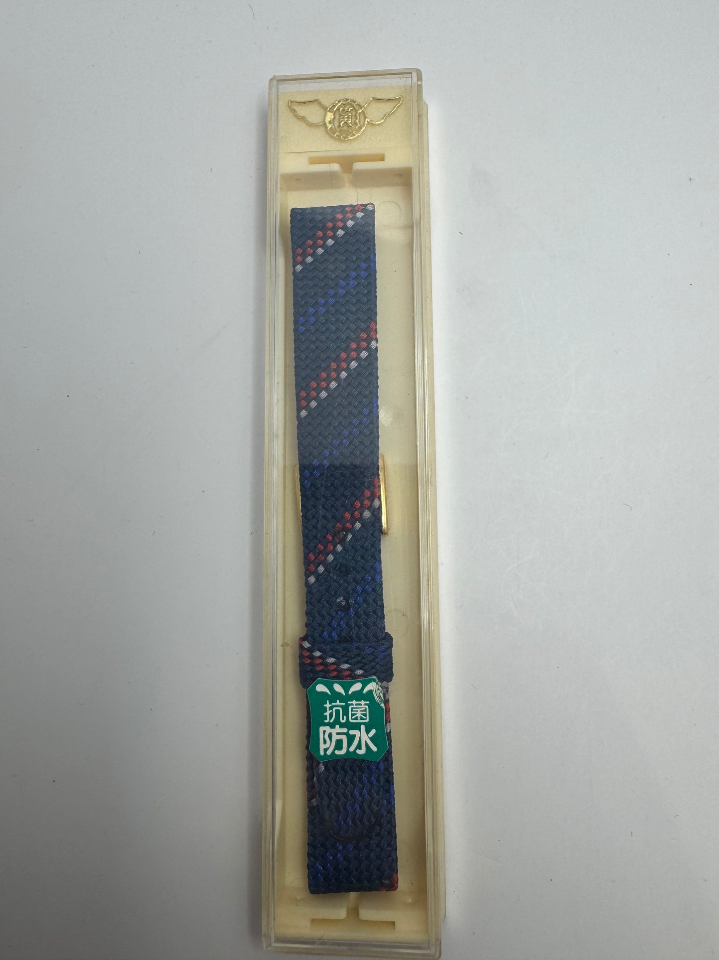 Vintage NOS Perlon-/Textil-Armband in Marineblau mit Rot-Weiß-Akzent, 15,5 mm, goldfarbene Schließe, mit Box (Japan)
