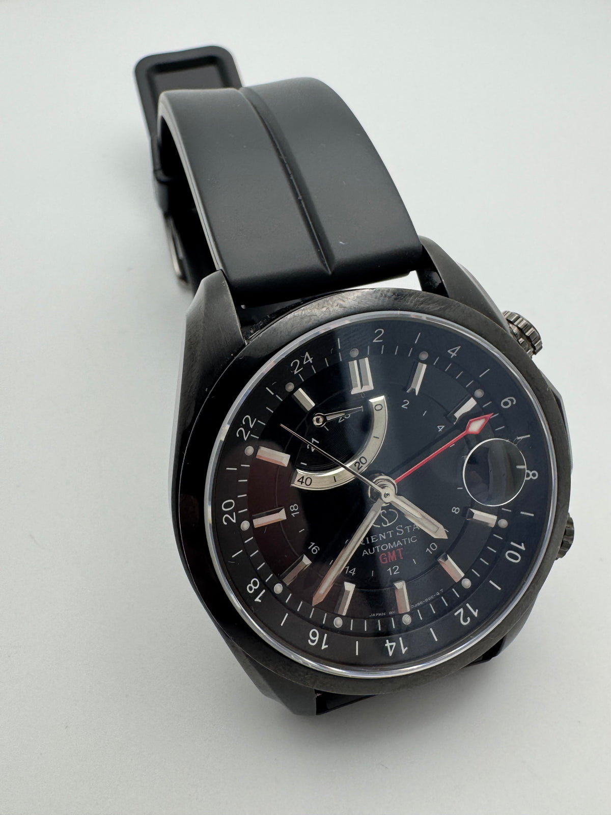 Orient Star Automatic GMT – black ion-plated, power reserve and second time zone – exhibition case back
