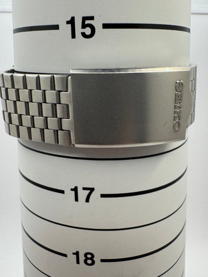 Seiko ELNIX Ref. 0703-7110 · Silbernes Sunburst-Zifferblatt · Mai 1975 · JDM · NOS - Originalband, Hangtag &amp; Anleitung