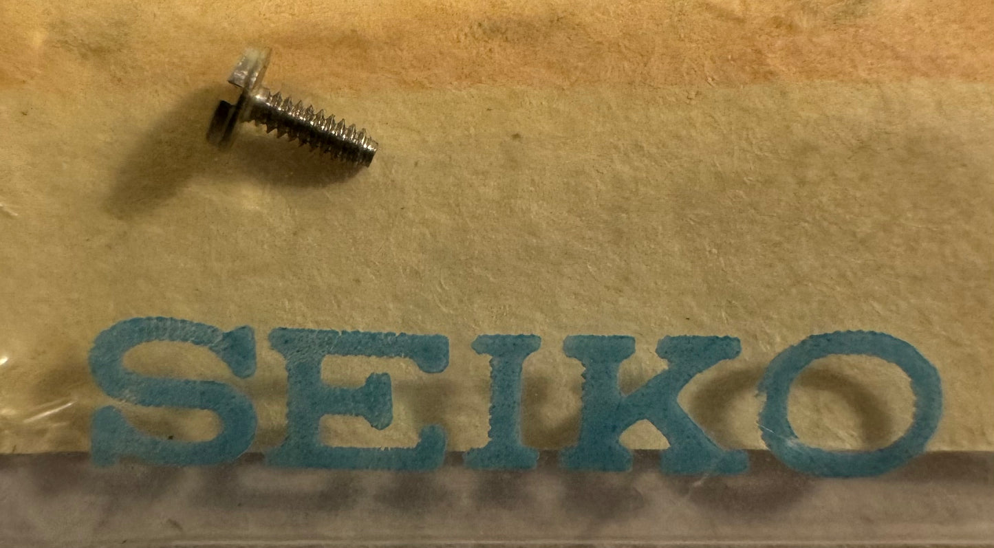 Pièce détachée Seiko 012387 (1 pièce) pour calibre 0843 – vis de boîtier – Neuve
