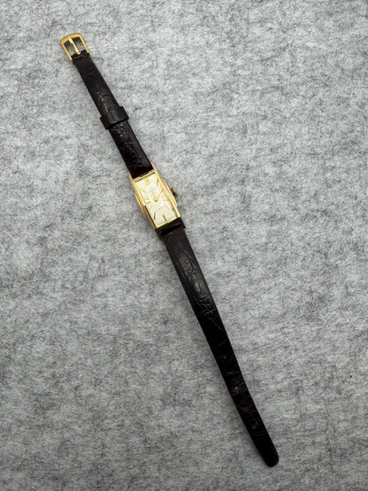 Seiko Solar 557 – Rectangular hand-wound watch in 20-micron gold plating (September 1959)